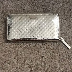 Kate Spade gold wallet.